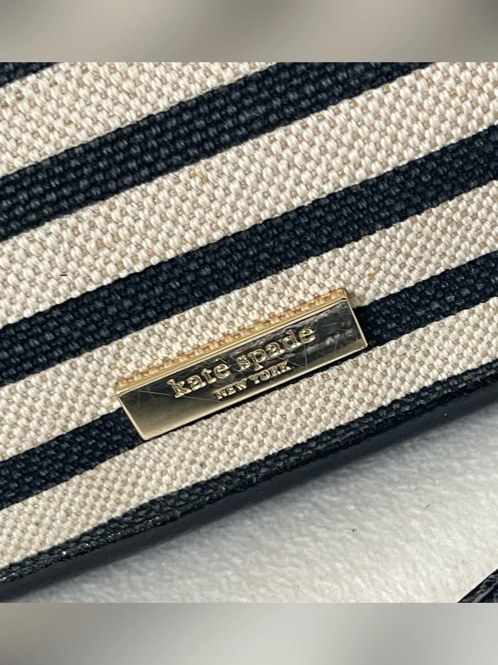 kate spade Black and Cream Striped Crossbody with Bow Detail
